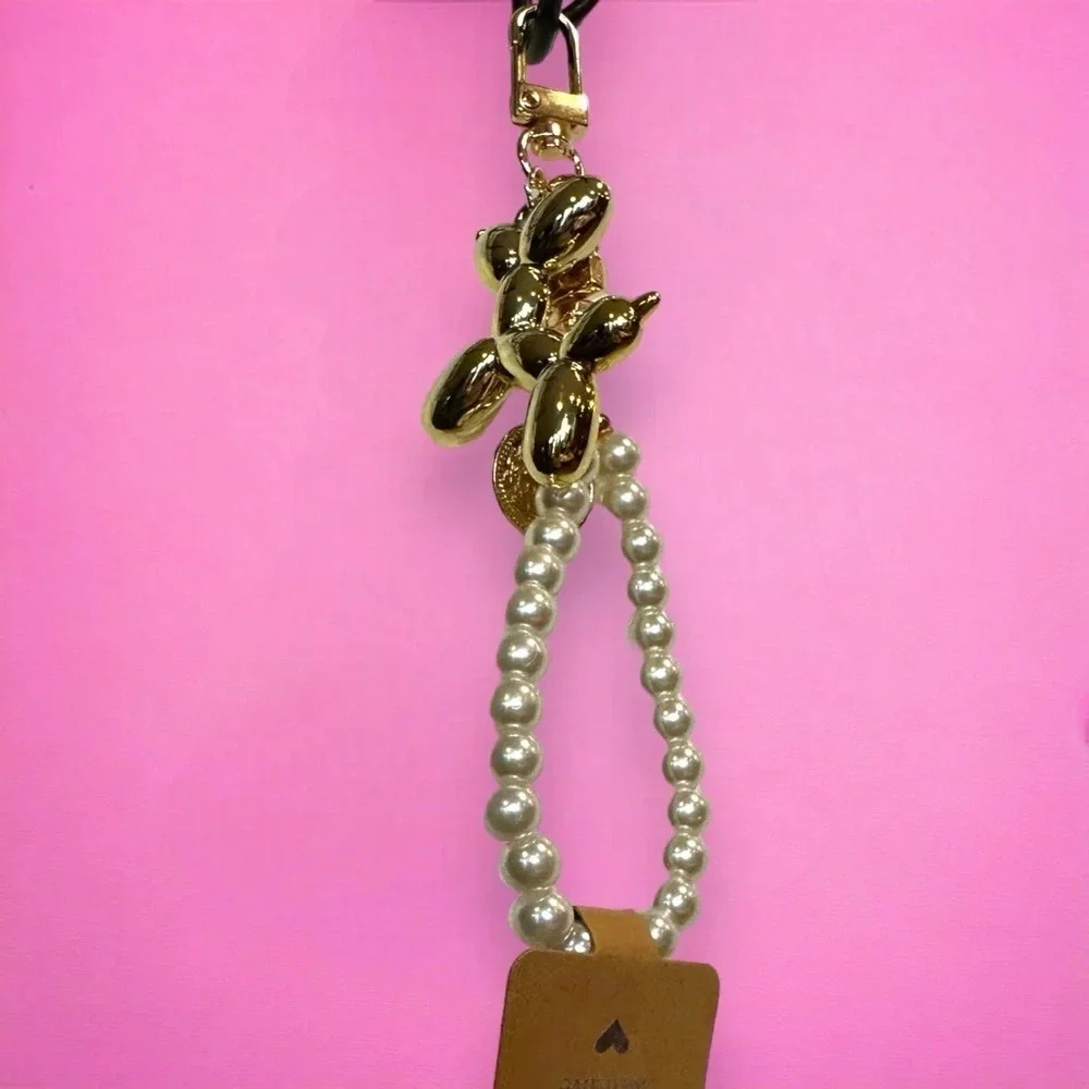 Balloon dog gold keychain with‎ pearl accent